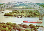 Ship passing under bridge.
